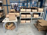 many boxes of beer on the table in the warehouse