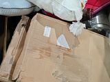 a pile of boxes and other items in a box