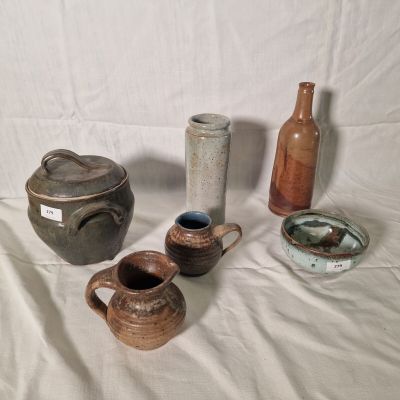 many different types of vases on the table