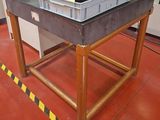 a laptop computer sitting on top of a table in a lab