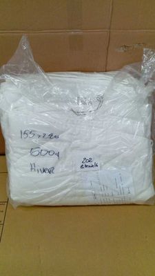 a bag of toilet paper sitting on top of a cardboard box