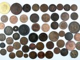 a lot of coins that are on the table