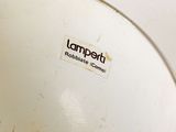 a close up of a white bowl with a label on it