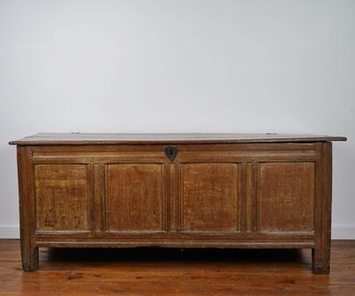 an antique oak chest with a marble top