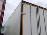 a truck that is parked in front of a building