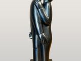 statue of a man and a woman holding hands on a base