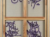 a picture of a window with graffiti written on it