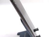 a close up of a cell phone on a stand