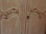an image of a very old looking cupboard in a room
