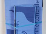 a blue box with a book on it sitting on a table