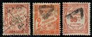a group of stamps with a picture of a man and a woman on them