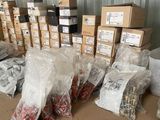 many bags of assorted items on a table