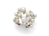 a close up of a ring on a white background