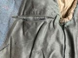 a piece of fabric that has been torn off of the jacket