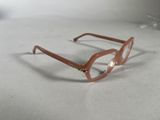 an image of a pair of glasses sitting on top of a table