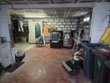 an image of a room with a lot of stuff on the floor