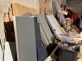 a pile of boxes and other items in a garage
