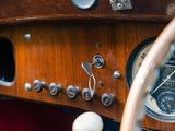 a close up of the dashboard of a vintage car