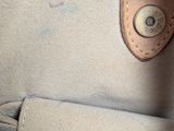 a close up of a bag with a handle on it