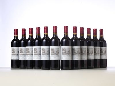 a group of bottles of wine sitting on top of a table