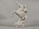 statue représentant un homme à cheval, sur laquelle est monté un cavalier