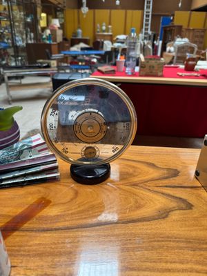 a wooden table with a clock on top of it
