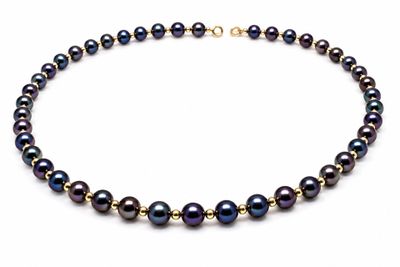 a black pearl necklace with a gold clasp