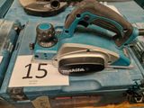 a corded sander and a circular sander on a box