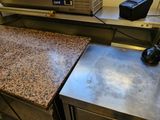 une photo d'une cuisine avec un plan de travail et un four grille-pain