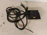 a black cord that is connected to a charger