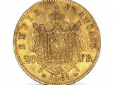 a gold coin with a coat of arms on it