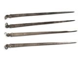 four different types of tools are shown on a white surface