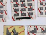 four pieces of paper that have been cut out to look like a chess game
