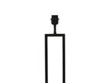 la lampe est posée sur un pied noir, sur un fond blanc