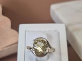 a ring that is sitting in a box on a table