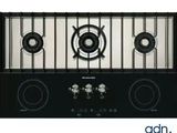 an image of a black stove top with four burners