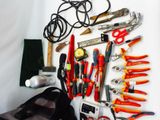 a lot of tools that are laying out on the table