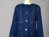 a close up of a blue jacket on a mannequin mannequin