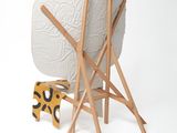 an image of a chair made of wood and a piece of paper