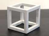 a small white cube that is on a table