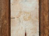 an old picture of a wooden frame with a piece of wood sticking out of it