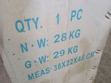 a white box with blue writing on it sitting on the ground