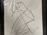 a drawing of a woman in a dress on a piece of paper