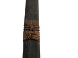 an image of a long wooden stick with a knot around it