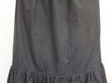 a black skirt with blue ruffles on a mannequin mannequin mannequin mannequin mannequin mannequin mannequin mann