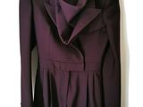 a picture of a purple jacket on a hanger
