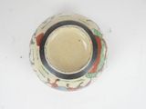 a picture of a ceramic bowl with a design on it