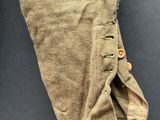 a close up of a pair of pants with buttons on them