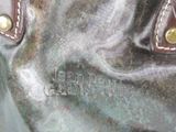 a close up of a bag with a name on it