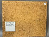 a picture of a piece of wood with a piece of paper attached to it